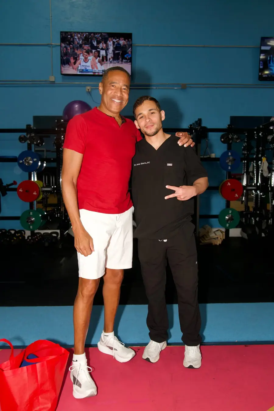 Mark Jones with Dr. Sierra in the gym